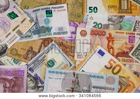 Multicurrency Background Of Euros Us Dollars, Russian Rubles, Egyptian Pounds And Ukrainian Hryvnias
