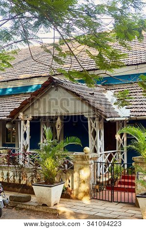 Panaji, India - December 15, 2019: A Narrow Lane Surrounded By Colorful Portuguese Houses In Panjim,