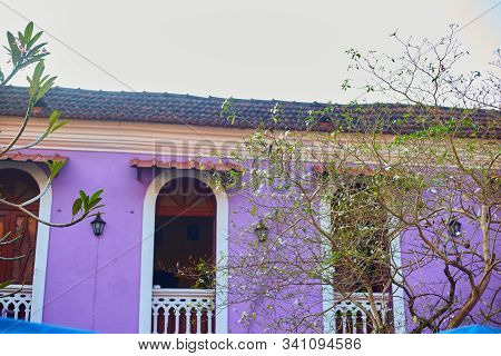 Panaji, India - December 15, 2019: A Narrow Lane Surrounded By Colorful Portuguese Houses In Panjim,