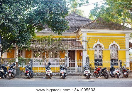 Panaji, India - December 15, 2019: A Narrow Lane Surrounded By Colorful Portuguese Houses In Panjim,