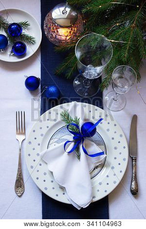 Christmas Or New Year Table Decoration In White And Blue Colors.