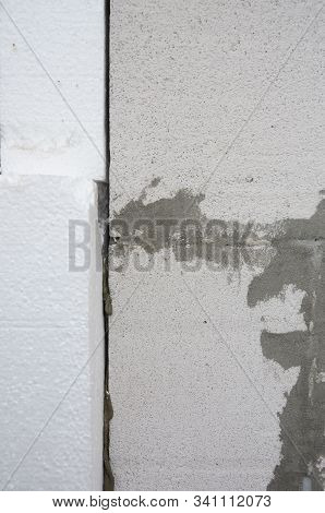 External House Wall Insulation Laers With Styrofoam. Installing Rigid Foam Insulation Board On House