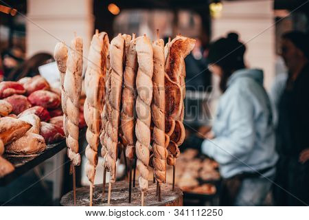 Bread On A Stick And Red Burger Buns Baked In A Wood Stove With Pulled Pork Chocolate Market Chocola