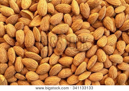 Background Of Almond Nuts. Healthy Snack And Food. Salted And Roasted Bbq Almonds. Top View.