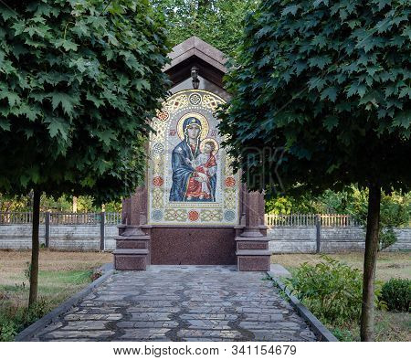 Large Icon Of The Mother Of God, Among The Trees, On A Warm Day, Close-up