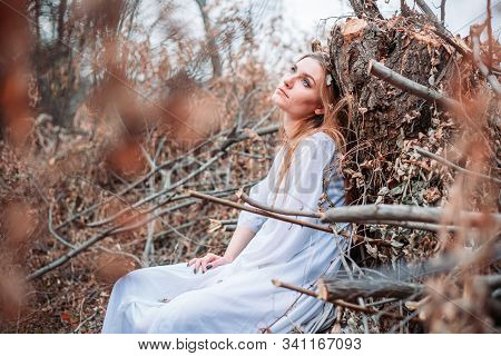 Outdoor Portrait Of Beautiful Blue Eyed Girl In White Dress, Looking Like A Fairy. Retro Vibes