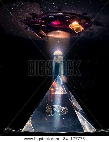 Abstract Sci-fi Collage - Flying Sucer Flying Over A Pyramid And Connecting With A Energy Ray. Eleme