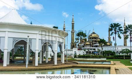 Beautiful Architectural Building At The Park For Resting With Crystal Mosque As Background.