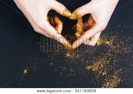 Female Hand Showing Heart Shape Gesture. Fastive Background, Space For Text