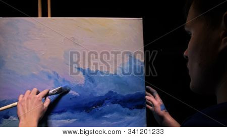 Artist Copyist Paint Seascape With Ship In Ocean. Craftsman Decorator Draw As Boat Sail On Blue Sea 
