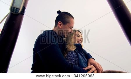 Adventure Love Couple On Hot Air Balloon Watermelon. Man And Woman Kiss Hug Love Each Other. Burner 