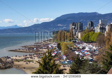 Downtown Vancouver, British Columbia, Canada - April 20, 2019: Aerial View Of Crowd Of People Gather