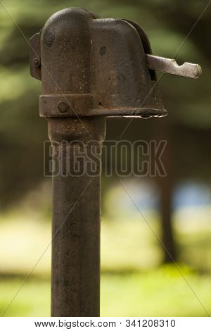 Old Street Water Standpipe. Old Soviet Street Free Standpipe In Summer On Blurred Background. Outdoo
