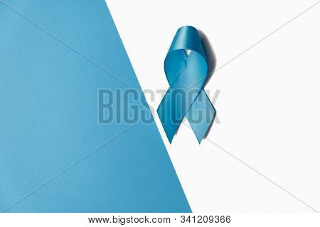Symbol For Support Men. Blue Ribbon On White And Blue Background. Prostate Cancer Awareness, Movembe