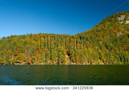 Reflection Of Hills In Koenigsee, Autumn Time In Bavaria