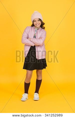 Cheerful Child Yellow Background. Beauty And Fashion For Kid. Back To School. Ready For Winter Vacat