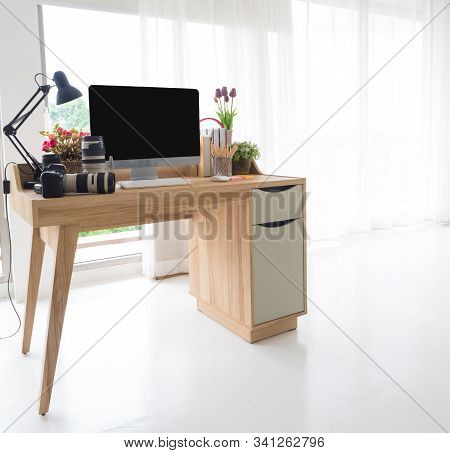 The White Background Copyspace Empty   Studio House Has A Wooden Desk, A Computer Labtop.keyboard Mo