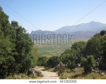 Beautiful Panorama Of Stone Mountains, Trees And Blue Sky