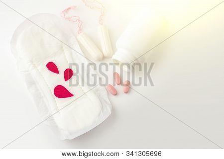 Protective Menstrual Pad With Fabric Blood Drops, Cotton Tampons, Pain Pills On White Background. Th