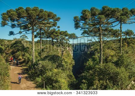 Cambara Do Sul, Brazil - July 16, 2019. Dirt Pathway And People At The Itaimbezinho Canyon With Rock