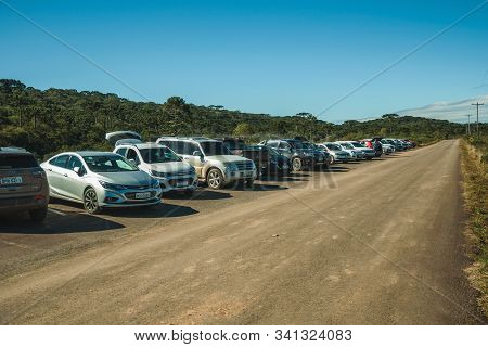 Cambara Do Sul, Brazil - July 16, 2019. Cars Parked By The Side Of A Paved Road At Aparados Da Serra