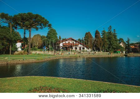 Gramado, Brazil - July 21, 2019. Wooded Park With The Joaquina Rita Bier Lake And House In German-in