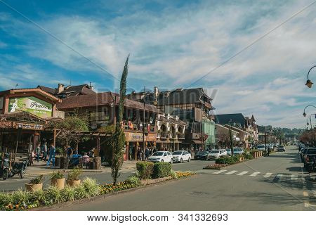 Gramado, Brazil - July 21, 2019. Buildings With Shops And People On Sidewalk At Borges De Medeiros A