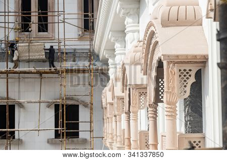 Decorated Windows, Columns And Arches In The Indian Temple Under Construction.