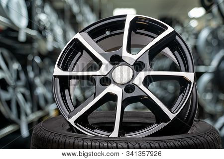 Cast Aluminum Disc Alloy Wheel Close Up On Background Of Tire Shop Inside