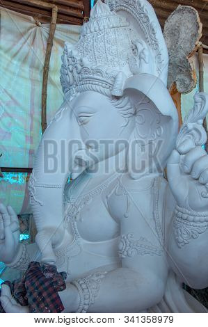 Statue Of Hindu God Ganesha. Close Up Of Ganesha Idol At An Artist's Workshop During Ganesha Festiva