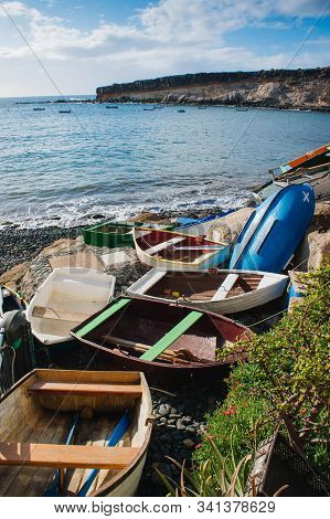 Adeje El Puertito. Tenerife. Spain. Colourful Rowing Boats, In The Foreground Of El Puertito Bay
