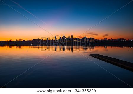 Late Dusk Over The Suggestive City Of Mantua (lombardy, Italy) With Mirror Reflections Of The Towers