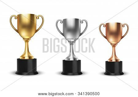 Vector Blank Golden, Silver And Bronze Champion Cup Set Closeup Isolated On White Background. Design
