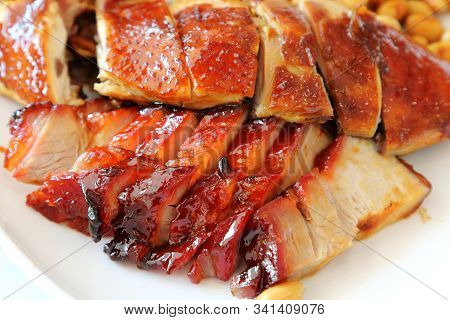 Roast Chicken And Roast Pork (char Siew) In A Plate, A Famous Dish In Singapore And Hong Kong