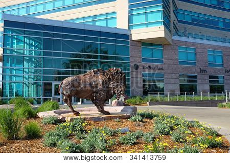 SIOUX FALLS, SOUTH DAKOTA - JUNE 21, 2017: Bison Sculpture at Cherapa Place along the Sioux City Riverwalk.