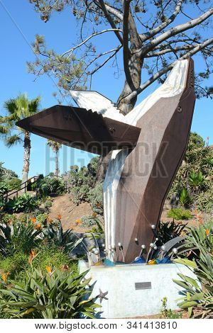 LAGUNA BEACH, CA, NOV 14, 2016: Humpback Whale Sculpture in Heisler Park. Stretching along the bluffs this oceanfront park has walking trails, gardens, a marine refuge, picnic tables and barbeques.