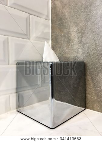 A Symmetrically Placed Aluminum Tissue Paper Box