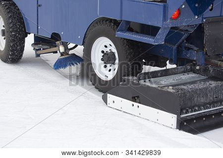 Special Machine Ice Harvester Cleans The Ice Rink. Transport Industry