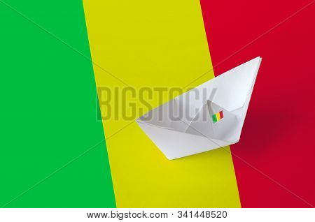 Mali Flag Depicted On Paper Origami Ship Closeup. Handmade Arts Concept