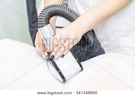 Lpg Girl Body Massage In Spa. The Girl Is Given A Hardware Massage, She Is Wearing A Special Jumpsui