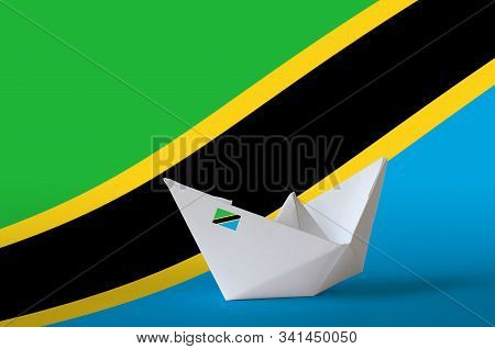Tanzania Flag Depicted On Paper Origami Ship Closeup. Handmade Arts Concept