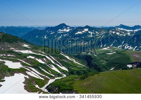 Panoramic View Of The City Petropavlovsk-kamchatsky And Volcanoes: Koryaksky Volcano, Avacha Volcano
