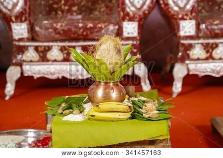 Traditional Indian Wedding Ceremony:  Coconut In Decorative Coper Kalash