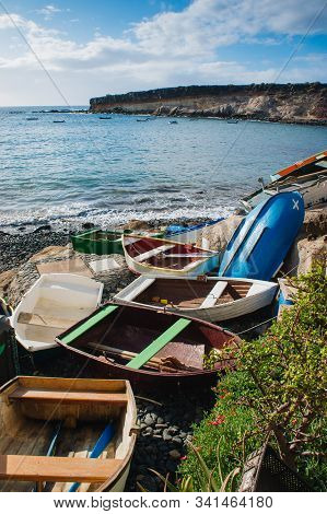 Adeje El Puertito. Tenerife. Spain. Colourful Rowing Boats, In The Foreground Of El Puertito Bay