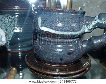 Coffee Cups With Saucer. Latgale Ceramics Is A Traditional Folk Craft. It Was Filled With Glaze Of T