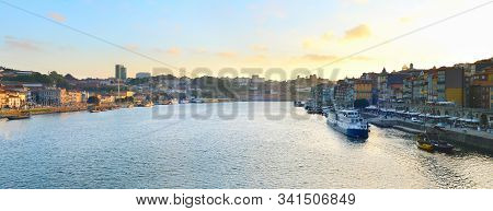 Panoramic View Porto Old Town, Villa Nova De Gaia, Douro River At Sunset. Portugal