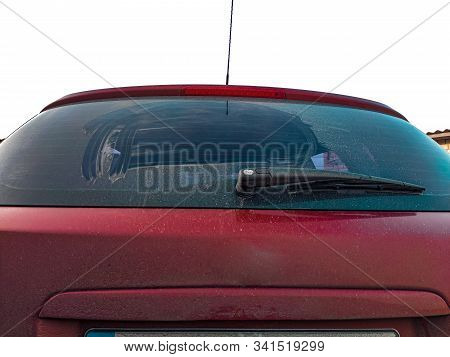 A Dirty Red Car After Rain. Dirty Car After A Trip Around The Countryside