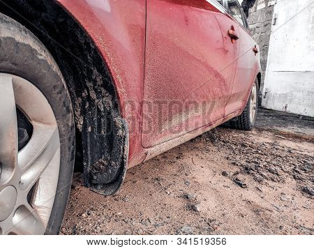 A Dirty Red Car After Rain. Dirty Car After A Trip Around The Countryside