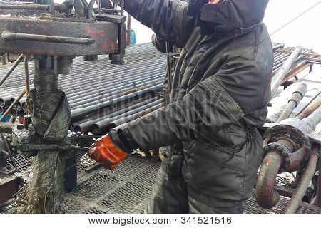 Drilling Work At The Well. Drill Rig, Rotation Of The Drill Pipe.