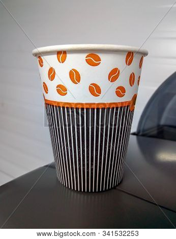 Paper Cup With Sleeve Ioslated Before White Background